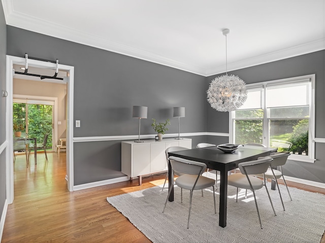 10 Wilton Hunt Rd, Wilton, CT 06897 - dining area with ornamental molding, light wood-style floors, baseboards, and a chandelier