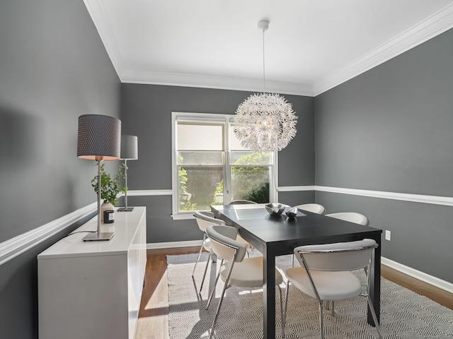 10 Wilton Hunt Rd, Wilton, CT 06897 - dining room featuring wood finished floors, ornamental molding, baseboards, and a chandelier