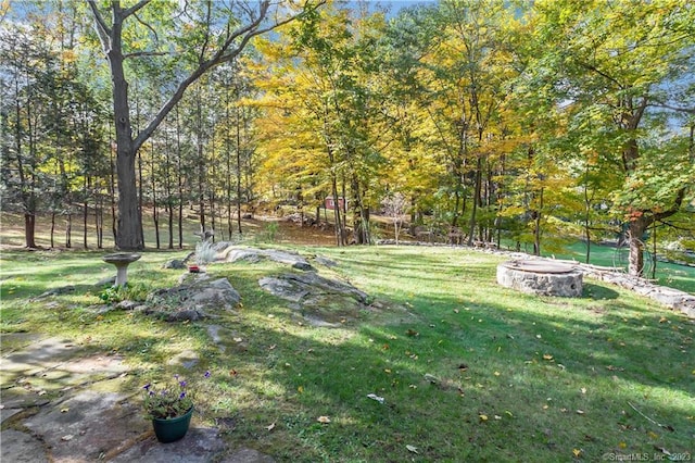 235 Whipstick Rd, Wilton, CT 06897 - view of green lawn featuring an outdoor fire pit