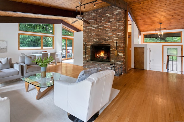 235 Whipstick Rd, Wilton, CT 06897 - living room with wood ceiling, ceiling fan, wood-type flooring, and a brick fireplace