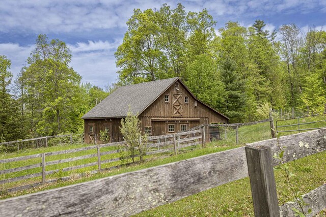 179 Parker Rd, Somers, CT 06071 - view of barn featuring a wooded view and fence