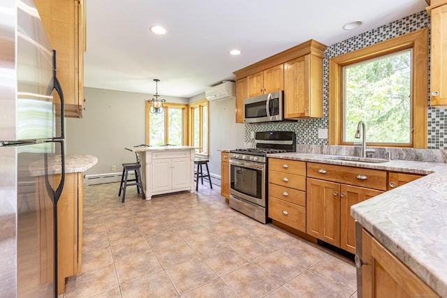 179 Parker Rd, Somers, CT 06071 - kitchen with appliances with stainless steel finishes, a wall unit AC, a baseboard radiator, a sink, and tasteful backsplash