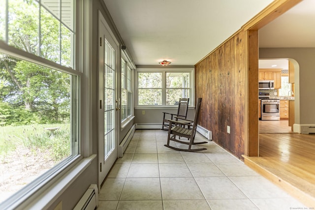 179 Parker Rd, Somers, CT 06071 - sunroom / solarium with plenty of natural light, tile patterned floors, french doors, and arched walkways