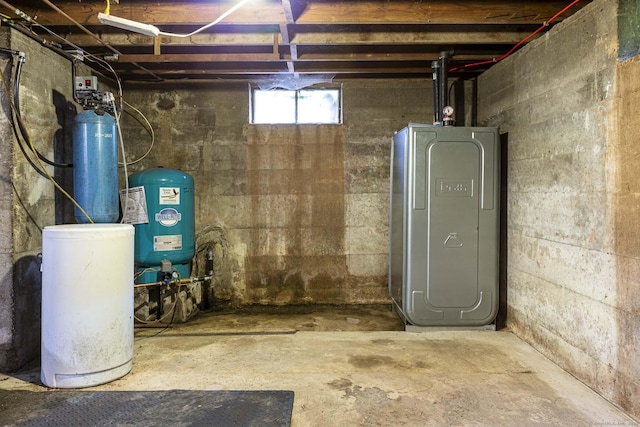 179 Parker Rd, Somers, CT 06071 - below grade area featuring a water pressure tank, electric panel, and a water softener