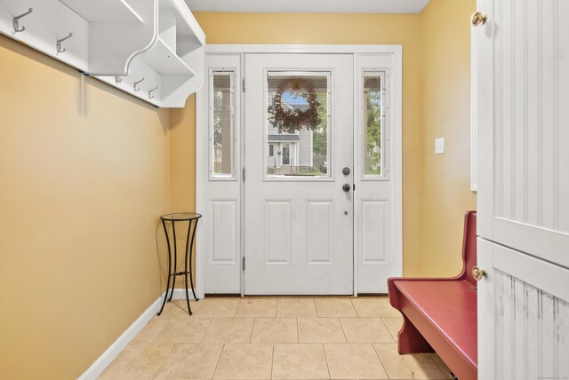 28 Edmund St, Stratford, CT 06614 - mudroom with light tile patterned flooring and baseboards