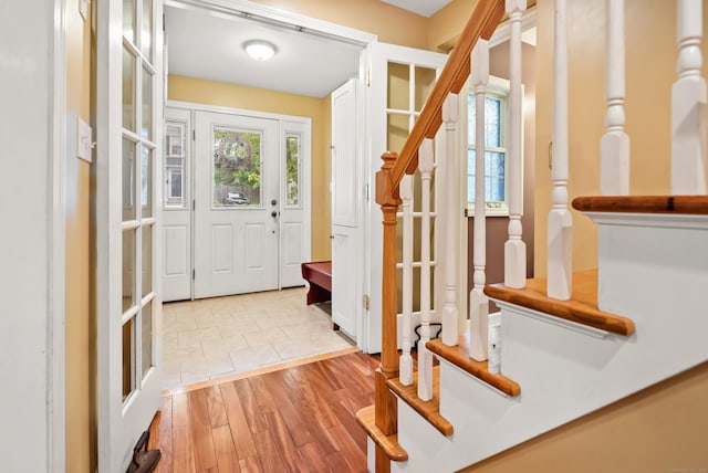 28 Edmund St, Stratford, CT 06614 - foyer entrance with stairs and light wood-style flooring
