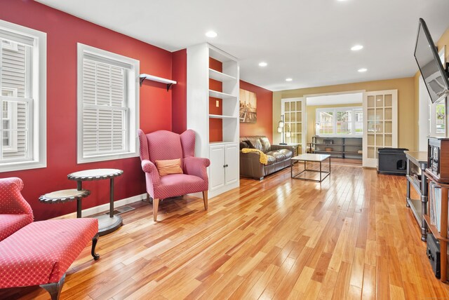 28 Edmund St, Stratford, CT 06614 - living area with light wood-style flooring, recessed lighting, and baseboards
