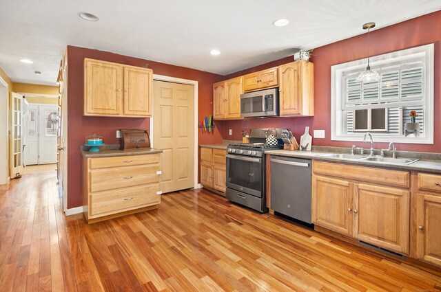 28 Edmund St, Stratford, CT 06614 - kitchen featuring stainless steel appliances, a sink, light brown cabinets, light wood-type flooring, and recessed lighting