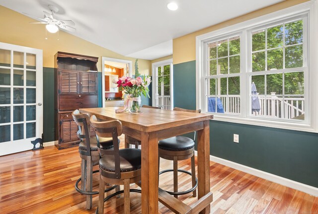 28 Edmund St, Stratford, CT 06614 - dining space with ceiling fan, light wood finished floors, lofted ceiling, and baseboards