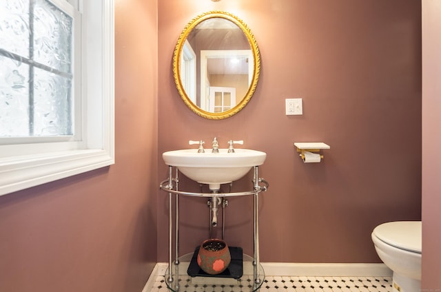 28 Edmund St, Stratford, CT 06614 - bathroom featuring baseboards and toilet