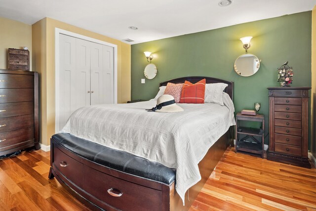 28 Edmund St, Stratford, CT 06614 - bedroom with wood finished floors, a closet, and baseboards