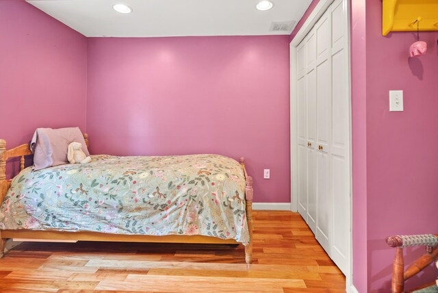 28 Edmund St, Stratford, CT 06614 - bedroom featuring light wood finished floors, a closet, recessed lighting, and baseboards