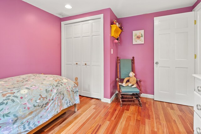28 Edmund St, Stratford, CT 06614 - bedroom with light wood-style floors, a closet, baseboards, and recessed lighting