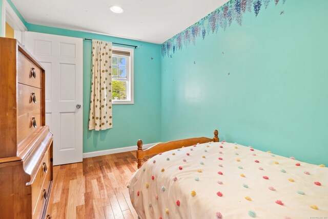 28 Edmund St, Stratford, CT 06614 - bedroom with light wood-style flooring, baseboards, and recessed lighting