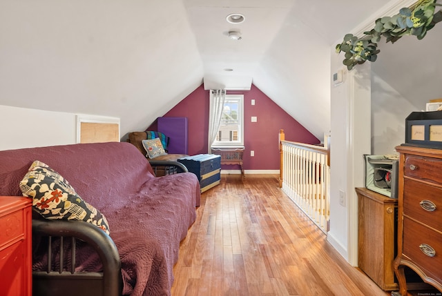 28 Edmund St, Stratford, CT 06614 - bedroom with light wood-type flooring, baseboards, and vaulted ceiling