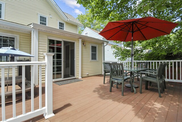 28 Edmund St, Stratford, CT 06614 - wooden terrace featuring outdoor dining space