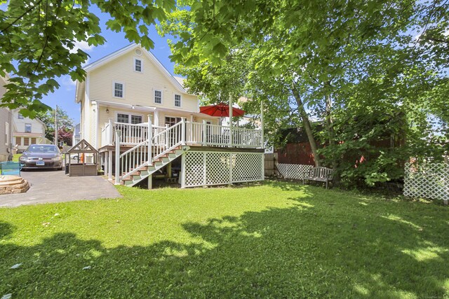 28 Edmund St, Stratford, CT 06614 - back of house with stairway and a deck