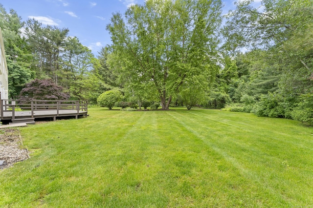 8 Michael Rd, Simsbury, CT 06070 - view of grassy yard with a wooden deck