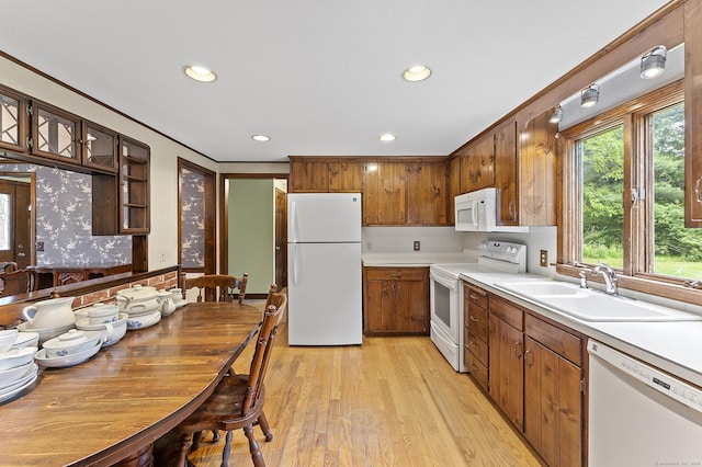8 Michael Rd, Simsbury, CT 06070 - kitchen featuring white appliances, a sink, recessed lighting, light wood-style floors, and light countertops