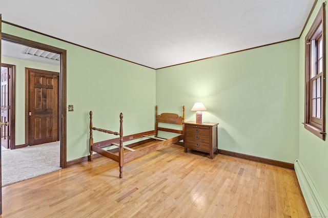 8 Michael Rd, Simsbury, CT 06070 - bedroom featuring a baseboard radiator, light wood-style floors, baseboards, and ornamental molding