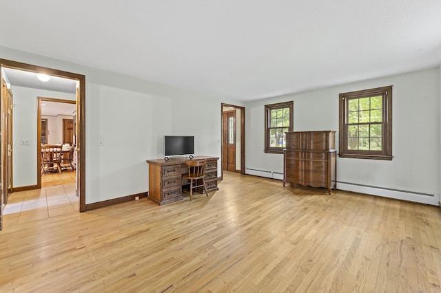 8 Michael Rd, Simsbury, CT 06070 - living room with light wood-type flooring, a baseboard radiator, a desk, and baseboards