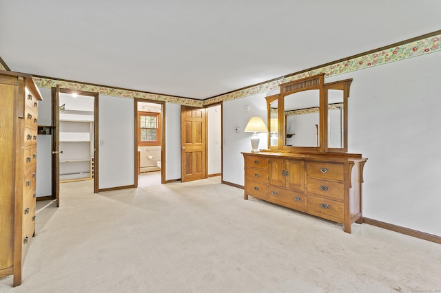 8 Michael Rd, Simsbury, CT 06070 - carpeted bedroom featuring a baseboard radiator, baseboards, a spacious closet, and a closet