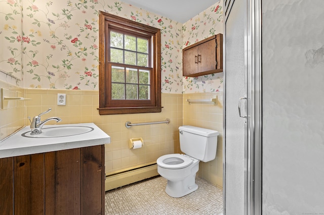 8 Michael Rd, Simsbury, CT 06070 - bathroom with a baseboard radiator, wallpapered walls, vanity, wainscoting, and toilet