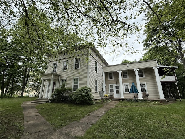 131 W Main St, Southington, CT 06479 - view of front facade with a front lawn