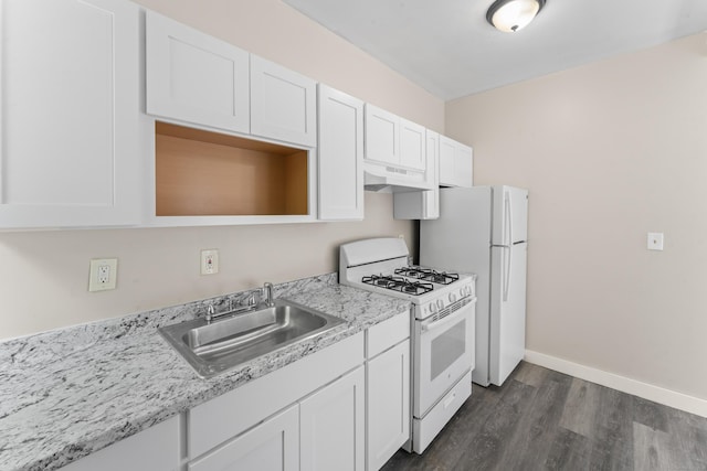 38 Ford St, New Haven, CT 06511 - kitchen with white appliances, a sink, under cabinet range hood, white cabinets, and dark wood-style floors
