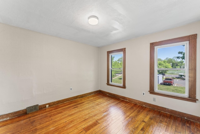 38 Ford St, New Haven, CT 06511 - empty room with light wood finished floors and baseboards