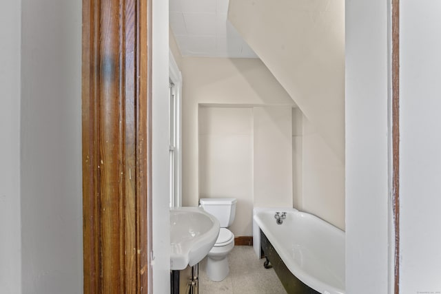 38 Ford St, New Haven, CT 06511 - bathroom with toilet, a bath, a sink, and baseboards