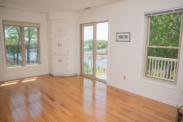 58 Quarry Dock Rd Unit 58, Branford, CT 06405 - unfurnished room featuring baseboards and light wood-style floors