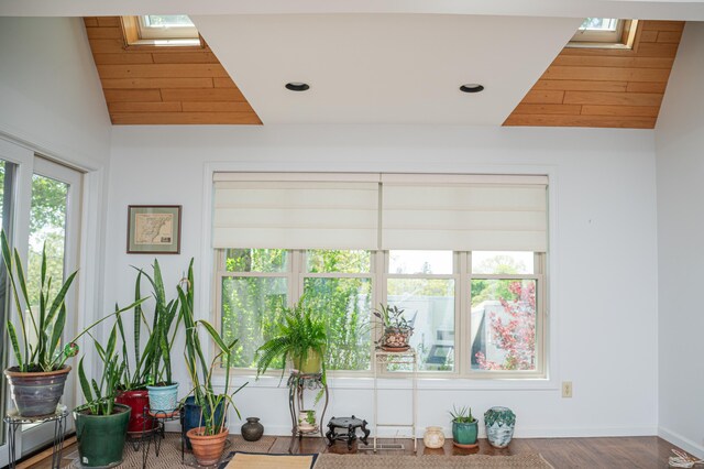 58 Quarry Dock Rd Unit 58, Branford, CT 06405 - living area featuring a skylight, vaulted ceiling, baseboards, wood finished floors, and recessed lighting