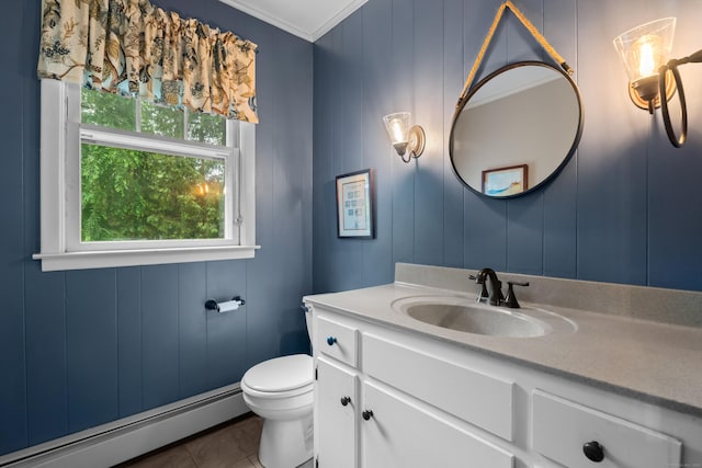 57 Elm Ridge Rd, Stonington, CT 06379 - bathroom featuring baseboard heating, vanity, crown molding, plenty of natural light, and tile patterned floors