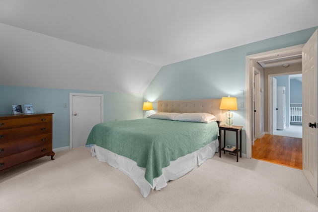 57 Elm Ridge Rd, Stonington, CT 06379 - bedroom with vaulted ceiling and carpet flooring