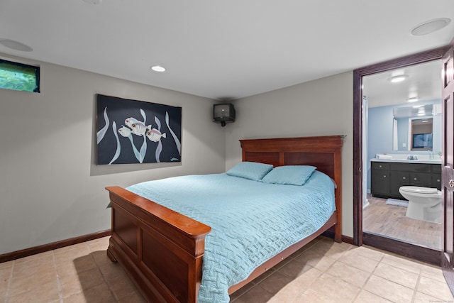 57 Elm Ridge Rd, Stonington, CT 06379 - bedroom with light tile patterned floors and ensuite bath