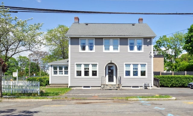 189 E Ave, Norwalk, CT 06855 - view of front of house featuring a chimney and entry steps