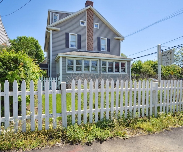 189 E Ave, Norwalk, CT 06855 - view of front of home featuring a chimney