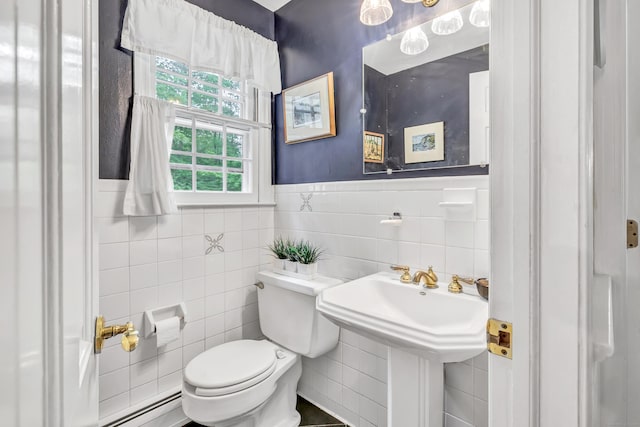 73 Golden Hill St, Trumbull, CT 06611 - bathroom with tile walls, toilet, and wainscoting