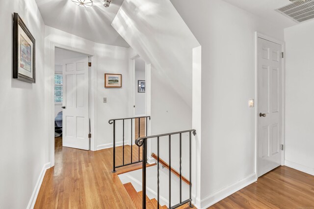 73 Golden Hill St, Trumbull, CT 06611 - hall with an upstairs landing, light wood-type flooring, and baseboards