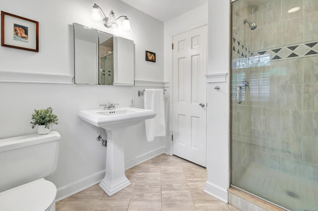73 Golden Hill St, Trumbull, CT 06611 - full bath with toilet, a shower stall, and baseboards