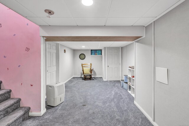 73 Golden Hill St, Trumbull, CT 06611 - finished basement featuring a paneled ceiling, carpet flooring, baseboards, and stairway
