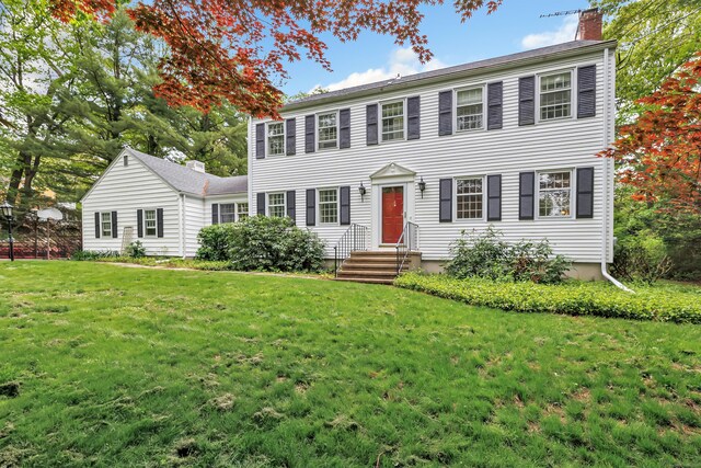 73 Golden Hill St, Trumbull, CT 06611 - colonial home with a chimney, a front yard, and entry steps