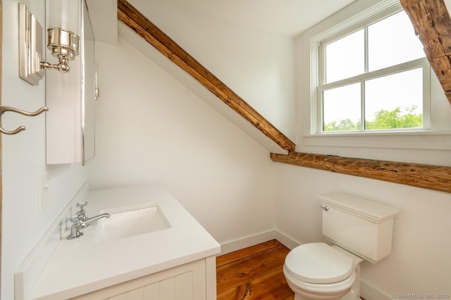 99 Sharon Mountain Rd, Sharon, CT 06069 - bathroom featuring wood finished floors, baseboards, toilet, and vanity
