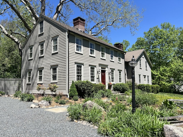 114 Ruscoe Rd, Wilton, CT 06897 - colonial home featuring a chimney