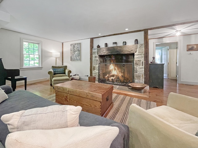 114 Ruscoe Rd, Wilton, CT 06897 - living area with wood finished floors, a fireplace, and baseboards