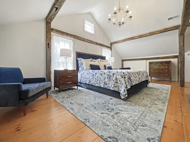 114 Ruscoe Rd, Wilton, CT 06897 - bedroom featuring lofted ceiling, a chandelier, and hardwood / wood-style floors