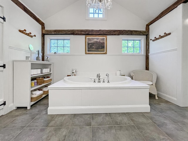 114 Ruscoe Rd, Wilton, CT 06897 - bathroom with a wainscoted wall, vaulted ceiling, a garden tub, a chandelier, and healthy amount of natural light