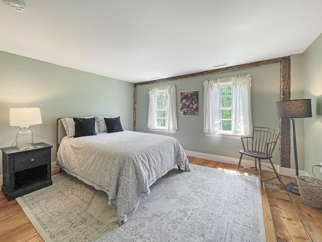 114 Ruscoe Rd, Wilton, CT 06897 - bedroom with hardwood / wood-style flooring and baseboards