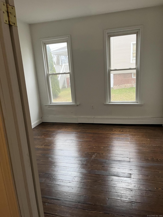 80 Olive St, Meriden, CT 06450 - spare room featuring hardwood / wood-style floors, baseboards, and baseboard heating